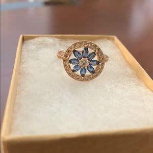 rose gold with blue sapphire flower ring